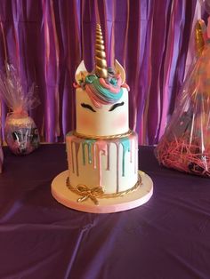 there is a cake that looks like a unicorn