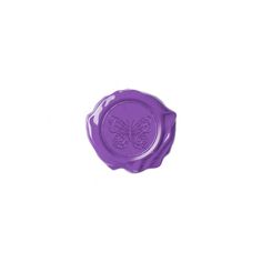 a purple wax stamp with a butterfly on it