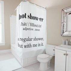 a bathroom with a shower curtain that says, hot shower hat / shower / adjective noon a regular shower, but with me in it