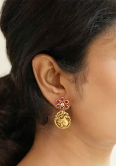 Embrace timeless elegance with these captivating earrings. Crafted from premium 92.5 silver and adorned with a luxurious 24kt gold plating with antique finish, the stud part of these earrings is embellished with mesmerizing floral with pink semi precious stones, adding a touch of femininity and gentle charm. The lower part features intricately designed antique peacocks with Nagas finish, exuding grace and sophistication. Simple yet charming! Note: Please note that there are no returns, exchanges Peacock Studs Gold, Simple Gold Ear Rings, Dancing Peacock, Ruby Jewelry Necklaces, Hand Jewelry Rings, Pearl Earrings Designs, Antique Gold Earrings, Simple Gold Earrings, Antique Necklaces Design