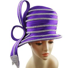 Introducing the majestic 9026 Church Hat, a harmonious blend of style and grace designed to complement your Sunday best and special occasion wear. Crafted with meticulous attention to detail, this hat features an exquisite purple hue seamlessly paired with shimmering silver accents, creating an accessory that is as much a work of art as it is a statement piece. The radiant rhinestone embellishments catch the light with every move, adding a touch of glamour and sophistication that will turn heads Church Hat, Church Suits, Church Hats, Rhinestone Embellishments, Style And Grace, Purple Hues, Silver Accents, Wide Brimmed, Timeless Pieces