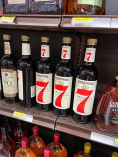 bottles of liquor are on display in a store