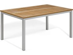 a wooden table sitting on top of a white floor next to a metal frame structure