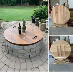 a table made out of pallet wood and wine glasses on the top, next to a potted plant