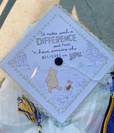 a graduation cap with the words it makes such a difference and pooh to have someone who believe in you