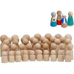 a group of wooden dolls standing next to each other