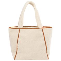 Add a touch of elegance to your daily look with the Toasty Tote. Crafted from luxurious cream-hued faux shearling, the bag features an eye-catching contrast with its faux suede binding and bottom panel. Secure your belongings with a zip pocket and snap button closure details. Carry your essentials in style with this must-have luxury piece. Features: Color: CreamMaterials: 100% PolyesterSize: 19" wide, 13" tall, 7" deepHandle: 10" Drop Fall Hats, Daily Look, Faux Suede, Hat Fashion, Sale Items, Zip Pockets