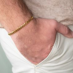 Mens Golden Bracelet, Mens Stainless steel Bracelet, Cuban Link Gold Bracelet for Men, Men Gold Bracelet Minimal, Men thin Bracelet A fashionable and stylish men's bracelet made of gold plated Stainless steel flat chain, Great for casual everyday use - Very lightweight and fashionable. Colors can be slightly different from the photo The product comes in a beautiful box with the brand's logo and you can ask for gift wrap too (see picture).  The bracelet is also available in silver color.  I have Golden Bracelets For Men, Men Gold Bracelet, Gold Bracelet For Men, Mens Bracelet Gold Jewelry, Man Gold Bracelet Design, Mens Choker Necklace, Bracelet Minimal, Mens Leather Necklace, Armband Tattoos