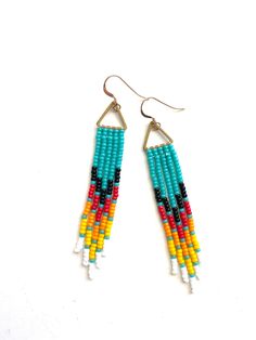 two pairs of beaded earrings on white background