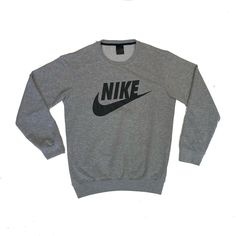 Vintage 90s Nike swoosh logo grey black crew neck sweater size medium size label faded, fits as a medium or oversized small Pit to pit: 22" Pit to cuff: 23" Collar to hem: 27" Fitness Style, Nike Outlet, Nike Swoosh Logo, Nike Free Run, Nike Free Runs, Looks Style, Mode Inspiration, Athletic Wear, Nike Sportswear