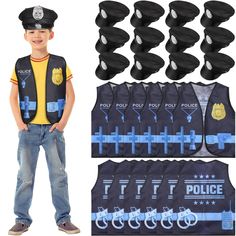 a young boy standing next to police vests