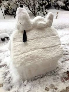 there is a snow sculpture made to look like a bear