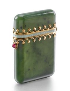 A Fabergé nephrite vesta case with enamelled gold mounts Bijoux Art Deco, Faberge Jewelry, Cabochon Ruby, Faberge Eggs, Nephrite Jade, Antique Boxes, Snuff Bottle, Green Enamel, Objet D'art