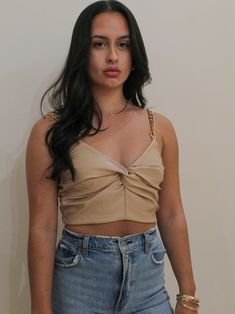 The answer to what to wear this weekend is here. The Twisted Chain Crop features a faux leather bodice with a twisted center detail, gold metal chain straps and exposed back zipper. Cropped 50% PU | 50% Polyester Minimal stretch Also available in Black Care: Hand wash SIZE LENGTH BUST WAIST SMALL 15.25" 28" 26" MEDIUM 15.5" 30" 28" LARGE 16" 32" 30" Leather Outfits For Women, Outfit Party Casual, Leather Crop Top Outfit, Leather Bodice, Trendy Christmas Outfits, Girls Night Out Outfits, Leather Crop Top, Neutral Tops, Twisted Chain