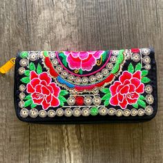 Mexican Floral Embroidered Woman’s Wallet Never Used/ Light Tarnished On Zipper Slider Pull Due To Storage. Tradition Floral Embroidered Exterior 100% Vinyl 8 Credit Card Slip Pockets And 1 Zippered Compartment Questions? Feel Free To Ask Reasonable Offers Welcome All Sales Are Final Happy Shopping Embroidered Wallets For Daily Use, Blue Leather Wallet, Louis Vuitton Keychain, Tory Burch Wallet, Vera Bradley Wallet, Miu Miu Wallet, Burberry Wallet, Cowboy Style, Wallet Organization