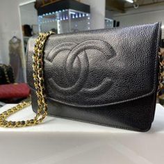 Color Black - Small Size Crossbody - Comes With Authenticity Card And Dust Bag. This Chanel Item Has Been Authenticated By Our In-House Trained Professionals And A Third-Party Authenticator. Chanel Is A Registered Trademark Of Chanel. Classic Formal Wallet With Chain Strap, Classic Chain Wallet For Formal Occasions, Classic Chain Wallets For Formal Occasions, Formal Rectangular Wallets With Chain, Formal Rectangular Wallet With Chain, Classic Crossbody Wallet With Chain Strap, Elegant Wallets With Chain For Daily Use, Elegant Leather Wallet With Chain Detail, Classic Gold Crossbody Wallet