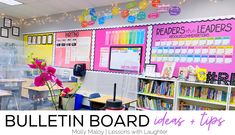 the bulletin board is decorated with pink and yellow flowers in front of bookshelves