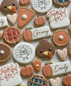 many decorated cookies with thanksgiving designs and words on them are arranged in the shape of turkeys