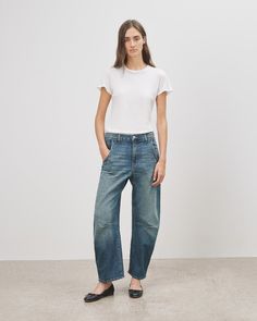 Designed for modern, gently tapered fit, the Emerson jean features a mid rise with a uniquely curved silhouette and dropped back pockets. Intended to be a relaxed slouchy fit. Complete with button zip fly and belt loops. Everyday Cropped Leg Jeans With Patch Pockets, Cropped Leg Jeans With Patch Pockets, Everyday Cropped Jeans With Patch Pockets, Everyday Jeans With Patch Pockets In Rigid Denim, Everyday Rigid Denim Jeans With Patch Pockets, Rigid Denim Jeans With Patch Pockets For Everyday, Everyday Jeans With Welt Pockets And Cropped Leg, Relaxed Fit Rigid Denim Jeans With Patch Pockets, Relaxed Fit Jeans With Patch Pockets In Rigid Denim