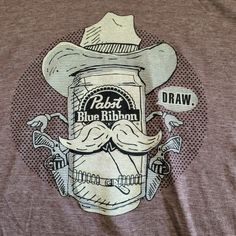 a t - shirt with an image of a man's hat and mustache