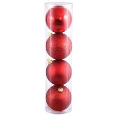 three red christmas balls in a clear tube