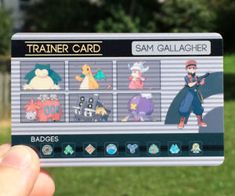 someone holding up a pokemon trainer card in front of the camera, with other characters on it