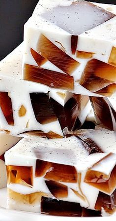 several pieces of chocolate and marshmallow fudge on a white plate