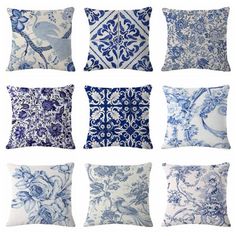 six blue and white pillows with different designs