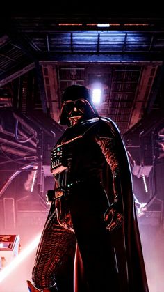 darth vader standing in the dark with his lights on