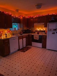 the kitchen is decorated with christmas lights and holiday decorations