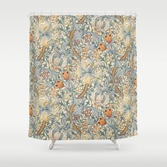 an ornate shower curtain with flowers and birds in blue, green, yellow and orange colors