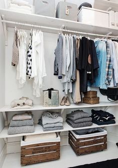 an organized closet with clothes and shoes