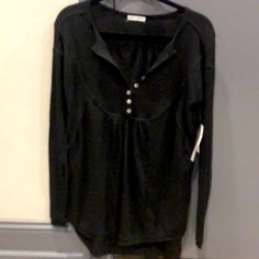 This Shirt Is Baggy, Baby Doll Like From Nordstrom Rack. Size Xs Nwt Has 8 Buttons Down The Front Black Casual Tops With Button Closure, Casual Black Tops With Button Closure, Black Crew Neck Top With Buttons, Black Button-up Casual Top, Casual Black Tops With Buttons, Black Tops With Button Closure For Fall, Black Long Sleeve Casual Knit Top, Casual Black Long Sleeve Knit Top, Black Long Sleeve Loungewear Top For Spring