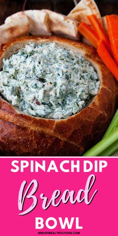 spinach dip in bread bowl with carrots and celery on the side