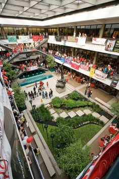 an overhead view of a shopping mall filled with people