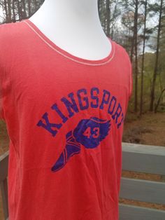 "track shirt vintage 80s sleeveless made by Champion red front says \"Kingsport\" with a shoe with wings and the number 43 the back says spirit of 76 with stars both are blue graphics SIZE TAG READS LARGE chest/waist 44\" length shoulder to hem 26\" GREAT VINTAGE CONDITION minor vintage wear light fading a few faded spots on the blue, shown in pictures THIS IS A GREAT AMERICANA SHIRT!!" Pastel Jacket, Track Shirt, Vintage Christmas Wrapping Paper, Peignoir Sets, 80s Mens, Mens Tank, Muscle Shirt, Wing Shoes, T Strap Heels