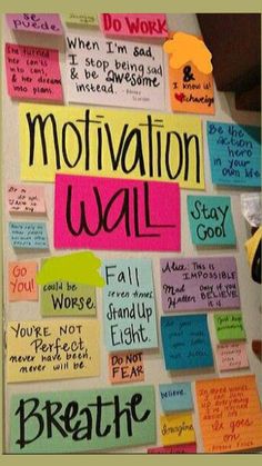 a bulletin board that has been decorated with notes on it and the words motivation wall written in