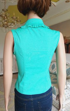 "womens Vest S mint Vest womens waistcoats Retro Vest Vintage zipper vest mint top Green Vest zipper Sleeveless top Summer top height of the woman in the photo - 180 cm Please refer to photos for details of condition. Condition: used, signs of age and wear see pictures Measurements: Length: 48 cm/19 \" Bust: 84 cm/ 33 \" Waist 68 cm/26.8 \" Size S note The color on the pictures may vary due to monitor settings and light reflections. Ready to ship Please do not hesitate to contact with me for any Green Stretch Vest, Fitted Green Vest Top, Green Stretch Sleeveless Blouse, Fitted Green V-neck Vest, Retro Vest, Mint Top, Zipper Vest, Vest Womens, Green Vest