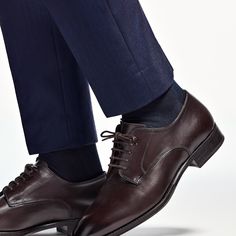 These classic brown derby lace-ups are crafted with a full leather sole and lining from supple calf leather. Brown Goodyear Welted Lace-up Derby Shoes, Timeless Brown Lace-up Shoes With Rubber Sole, Timeless Brown Lace-up Oxford Shoes, Timeless Brown Oxford Lace-up Shoes, Semi-formal Derby With Stitched Sole, Classic Brown Dress Shoes For Derby, Timeless Brown Leather Shoes For Derby, Timeless Brown Lace-up Shoes With Leather Sole, Formal Lace-up Oxfords