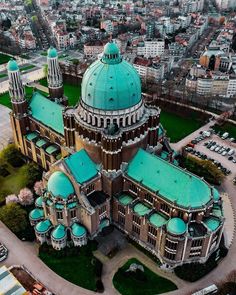 an aerial view of a large building in the city