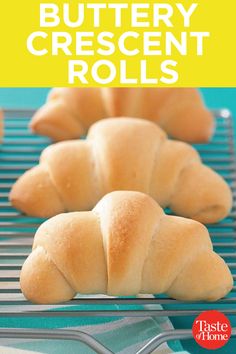 buttery crescent croissant rolls on a cooling rack with the title overlay