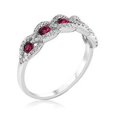 Ross-Simons - .50ct t. w. Ruby, .23ct t. w. Diamond Band Ring in 18kt White Gold. Size 7. Flaunting a fabulous fusion of sparkle and color, this band ring presents five radiant .50 ct. t. w. round rubies inside luminous .23 ct. t. w. round brilliant-cut diamond halos. Crafted in 18kt white gold. 3/16" wide. Diamond and ruby band ring. Ruby birthstones are the perfect gift for July birthdays. Ruby Ring With Pave Setting And Diamond, Ruby Ring With Diamond Pavé Setting, White Gold Ruby Ring With Pave Setting, Formal White Gold Ruby Ring With Pave Setting, Formal Ruby Ring With Pave Setting And Round Cut, Diamond White Ruby Ring With Diamond Accents, Ruby Ring With Brilliant Cut Cubic Zirconia, Brilliant Cut Cubic Zirconia Ruby Ring, Fine Jewelry Ruby Ring With Pave Setting