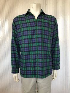 Vintage checkered shirt Pierre Cardin Green and Purple Men's Shirt with long sleeves size L-XL Made in France Lumberjack shirt Brand: Pierre Cardin Country of manufacture: France Size listed: the label is no longer readable, corresponds to L-XL era: 80s Material: cotton and polyester blend Color: green and purple, red Patterns: tiles Long sleeves Pocket: 1 chest pocket with logo embroidered in black Closure: buttons in front The model is an L Corresponds to L-XL Can fit different sizes depending Purple Guy, Checkered Shirt, Red Pattern, Lumberjack, Pierre Cardin, Mode Vintage, Shirt Brand, Logo Embroidered, Made In