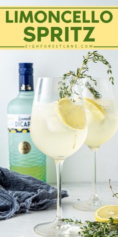 two glasses filled with lemonade spritz and garnished with fresh herbs