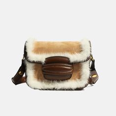 Featured suede cowhide leather Fur trim design Solid shoulder strap High-quality metals Solid buckle closure Careful lining & stitching Bag measures: L8.3”(21cm) x W3”(7.5cm) x H6.3”(16cm) Messager Bag, Fur Handbags, Trim Design, Real Leather Handbags, Luxury Branding Design, Fur Bag, Leather Saddle Bags, Saddle Bag, Mink Fur