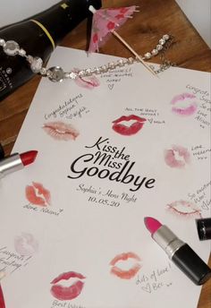 lipstick is laying on top of a sheet of paper with the words kiss me, miss goodbye written on it