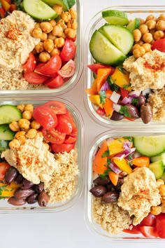 four plastic containers filled with assorted veggies and chickpea salads