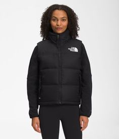 Built for mountain and city life, the Women’s 1996 Retro Nuptse Vest has an unmistakable silhouette. Featuring a water-repellent ripstop fabric and oversized baffles for warmth, this throwback design will help keep you dry and covered. Vest Northface, 1996 Nuptse Jacket, Nuptse Vest, The North Face 1996 Retro Nuptse, 1996 Retro Nuptse Jacket, The North Face 1996, North Face 1996, Retro Nuptse Jacket, Nuptse Jacket