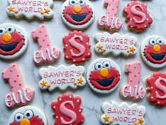 decorated cookies with the numbers one, two, three and six for sesame street's 1st birthday