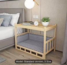 a bed room with a neatly made bed and a night stand next to the bed